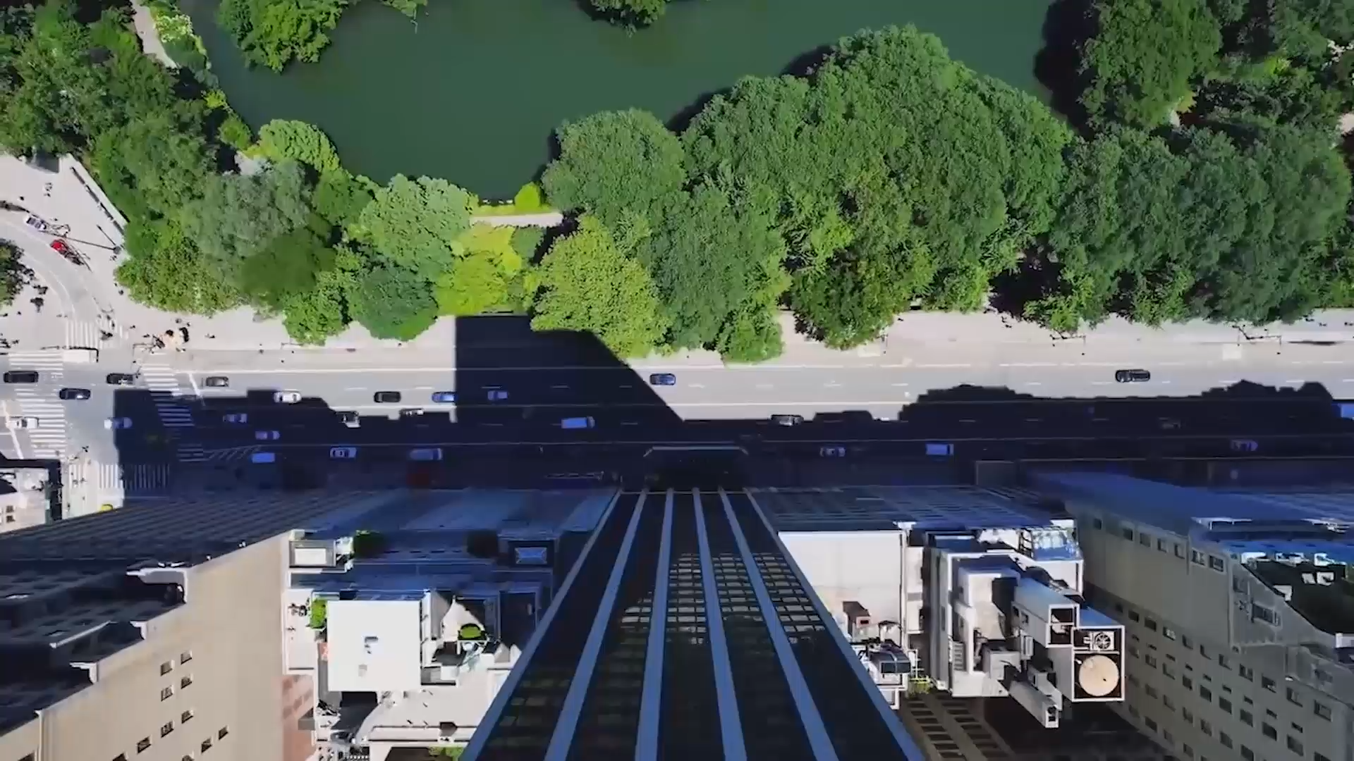 An aerial view of a high-rise building in an urban setting.